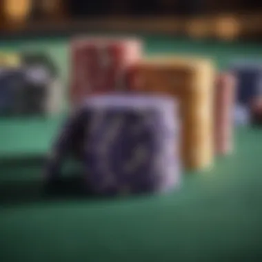 A close-up of colorful casino chips stacked on a gaming table.